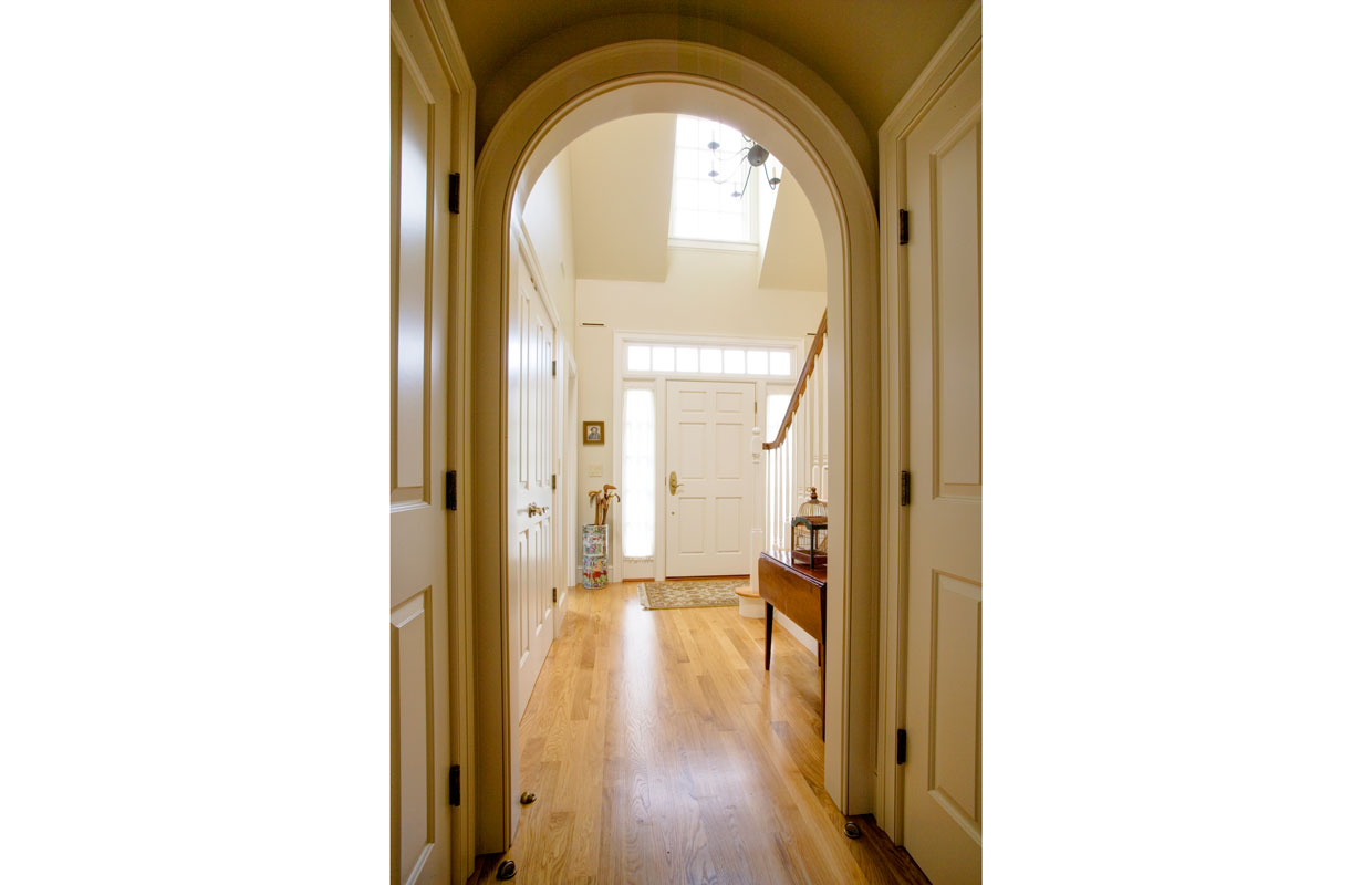 view of the entry from inside down a hallway