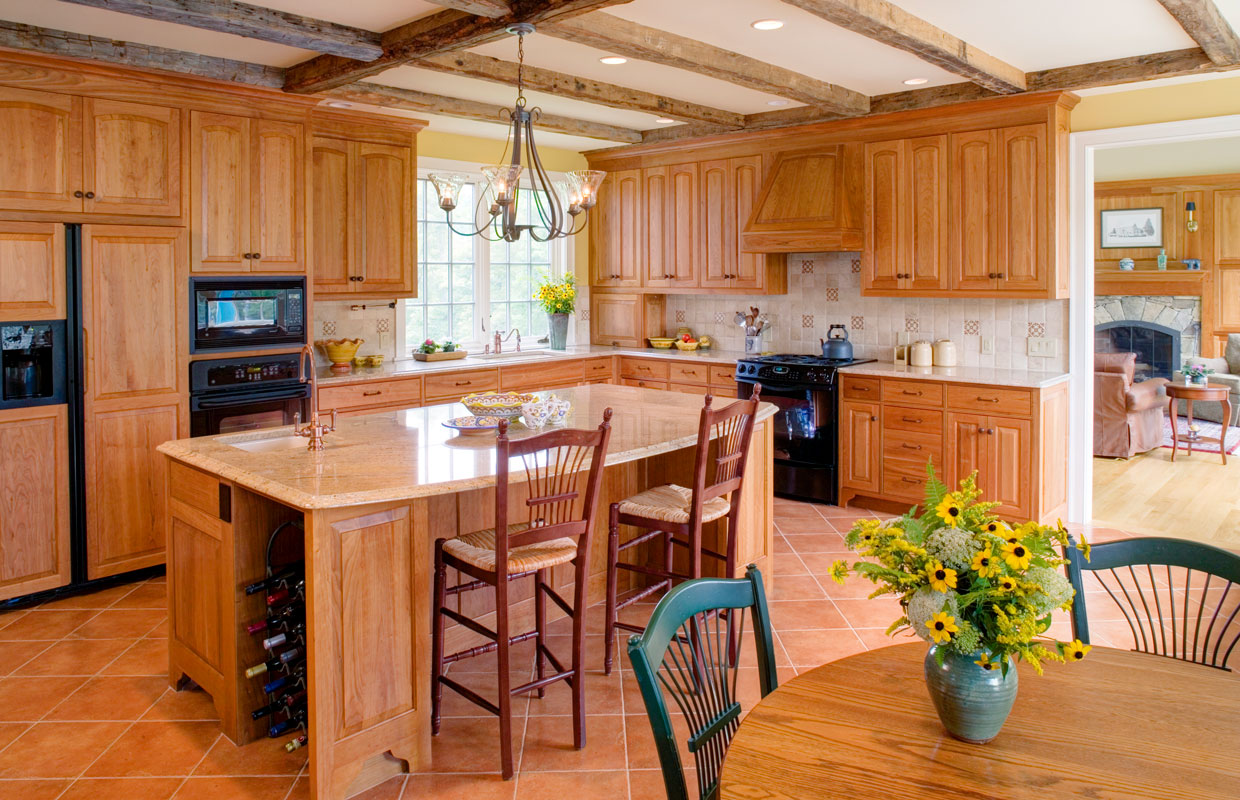 large kitchen with all wood accents and an island