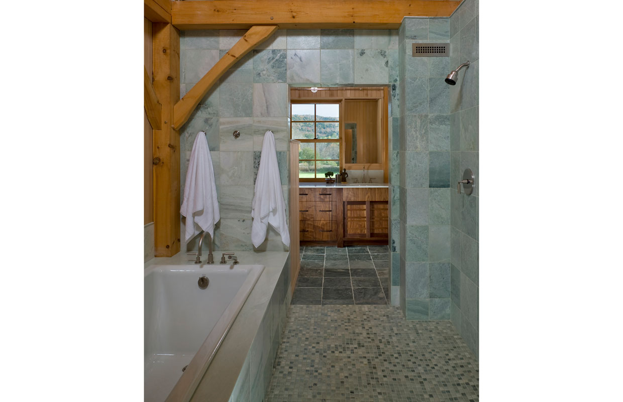 tile shower room with a tub