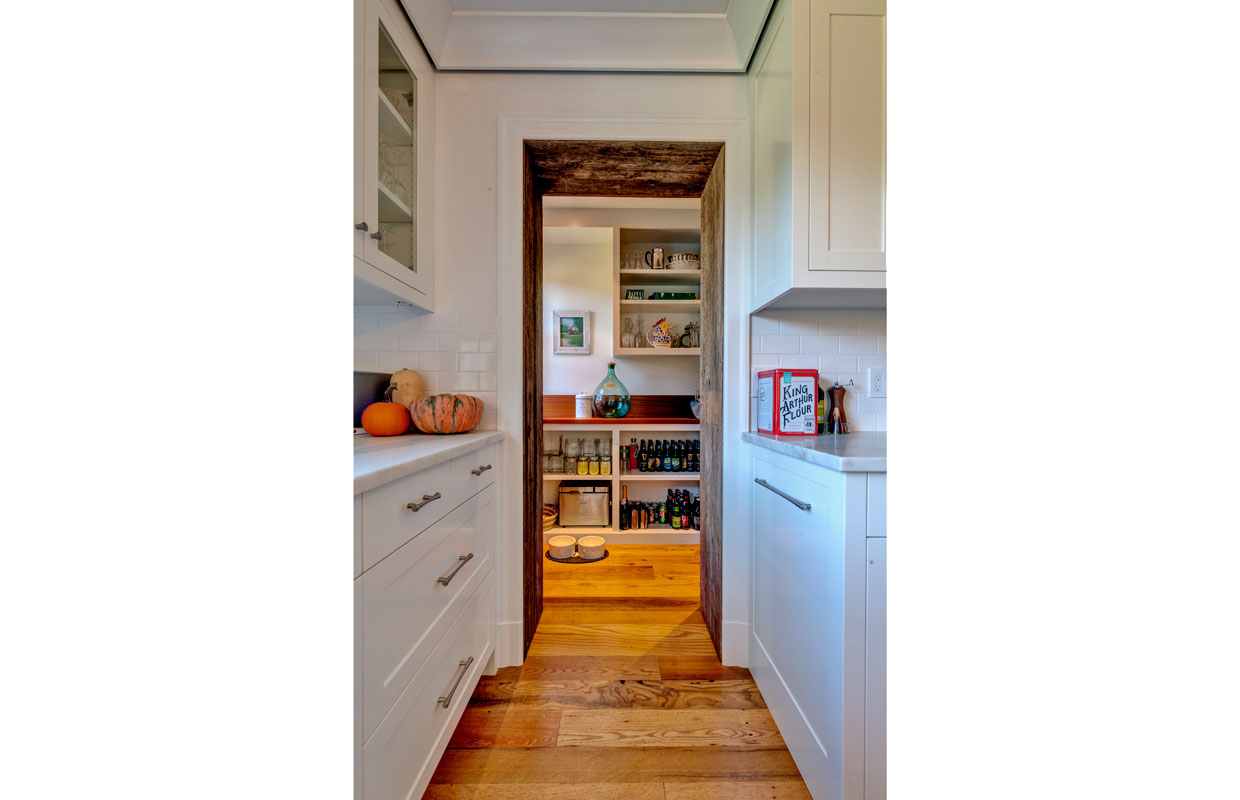 view of a large pantry from across a ktichen