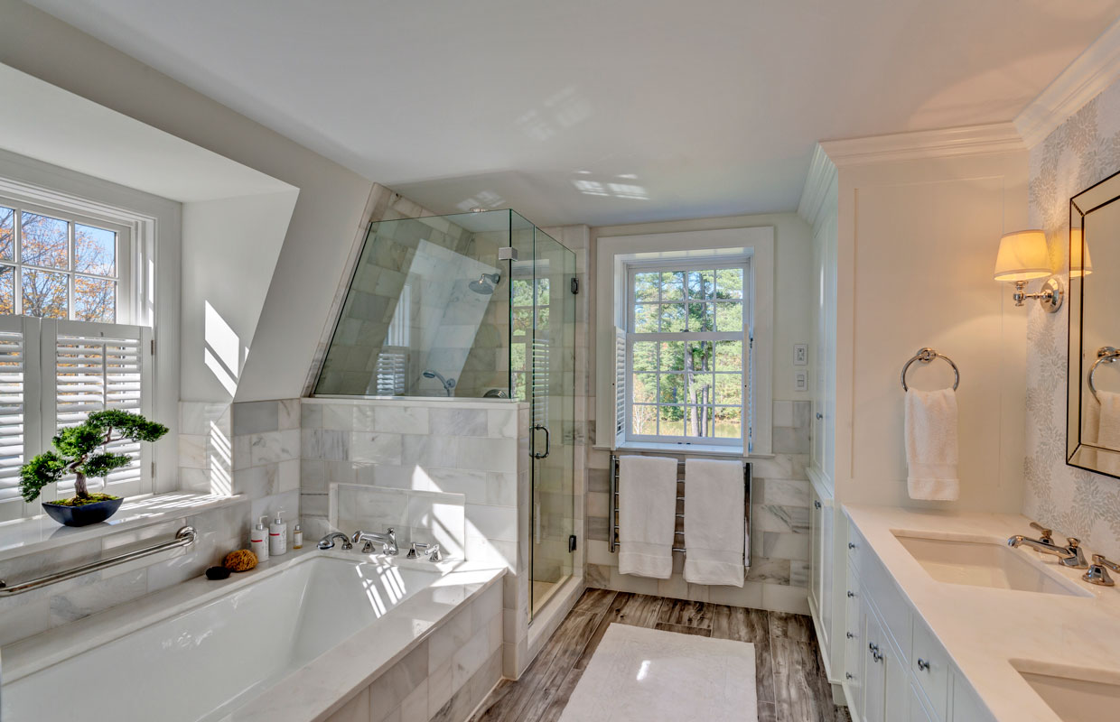 large white bathroom with a tub