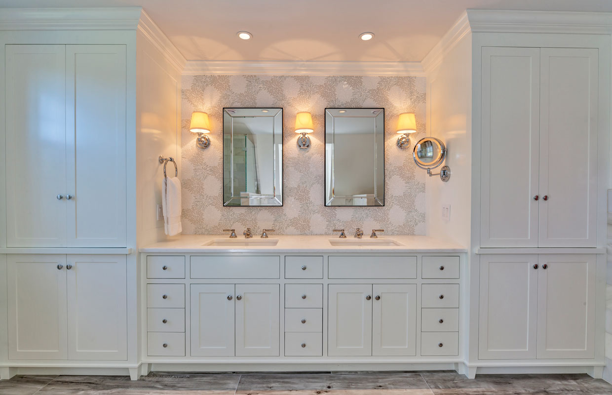 his and hers sinks on a wall with white cabinets