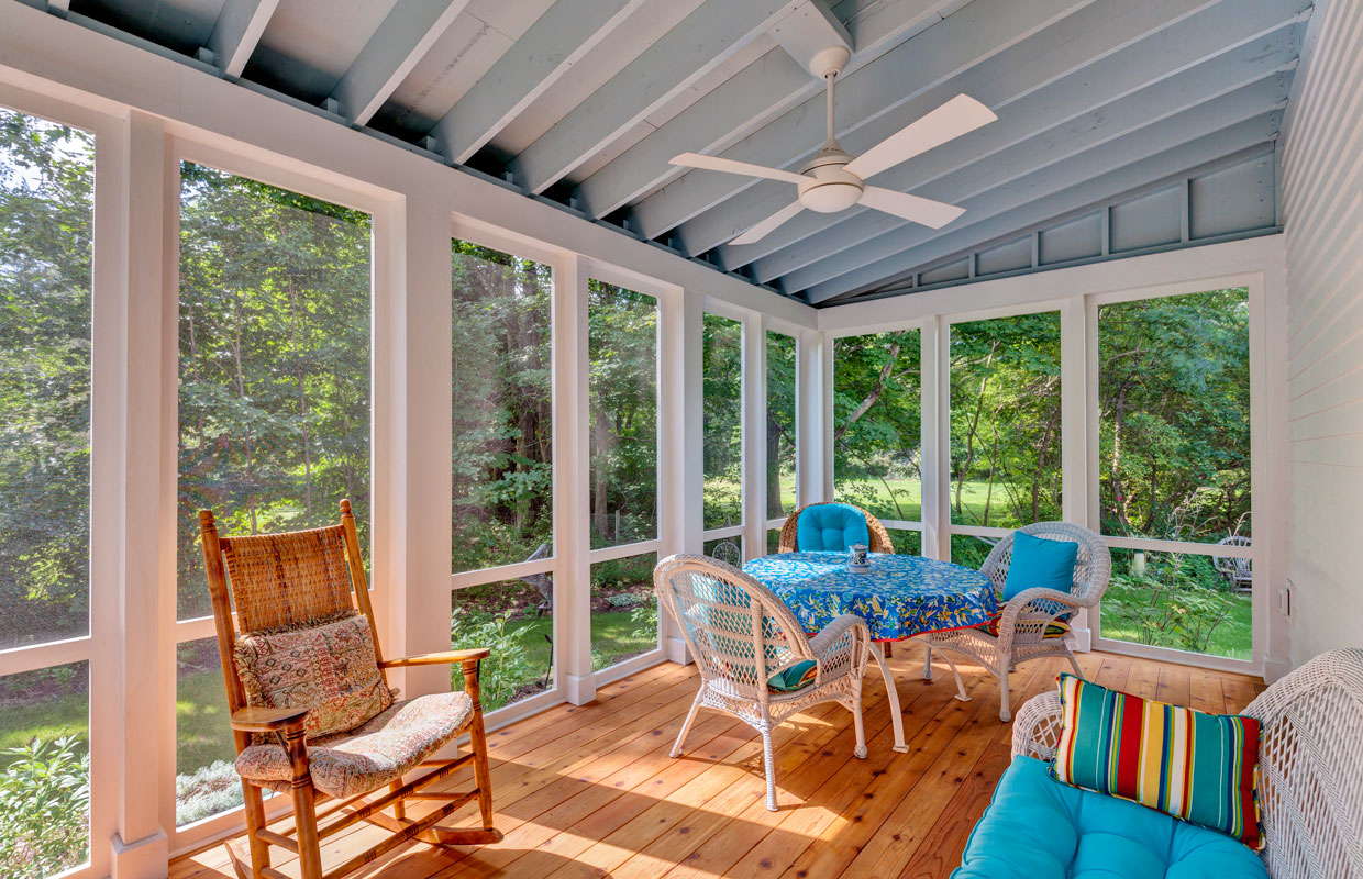 3 season porch view from the inside with a ceiling fan