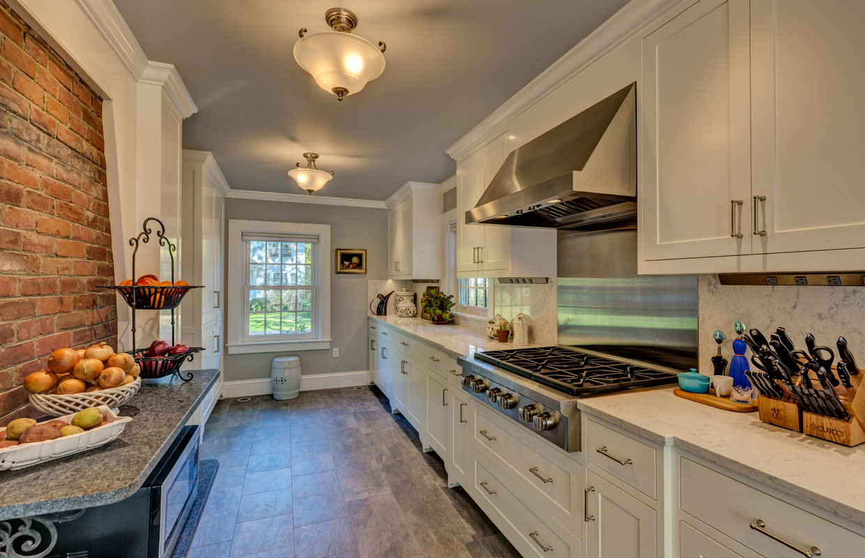 large kitchen with fruit on the counter