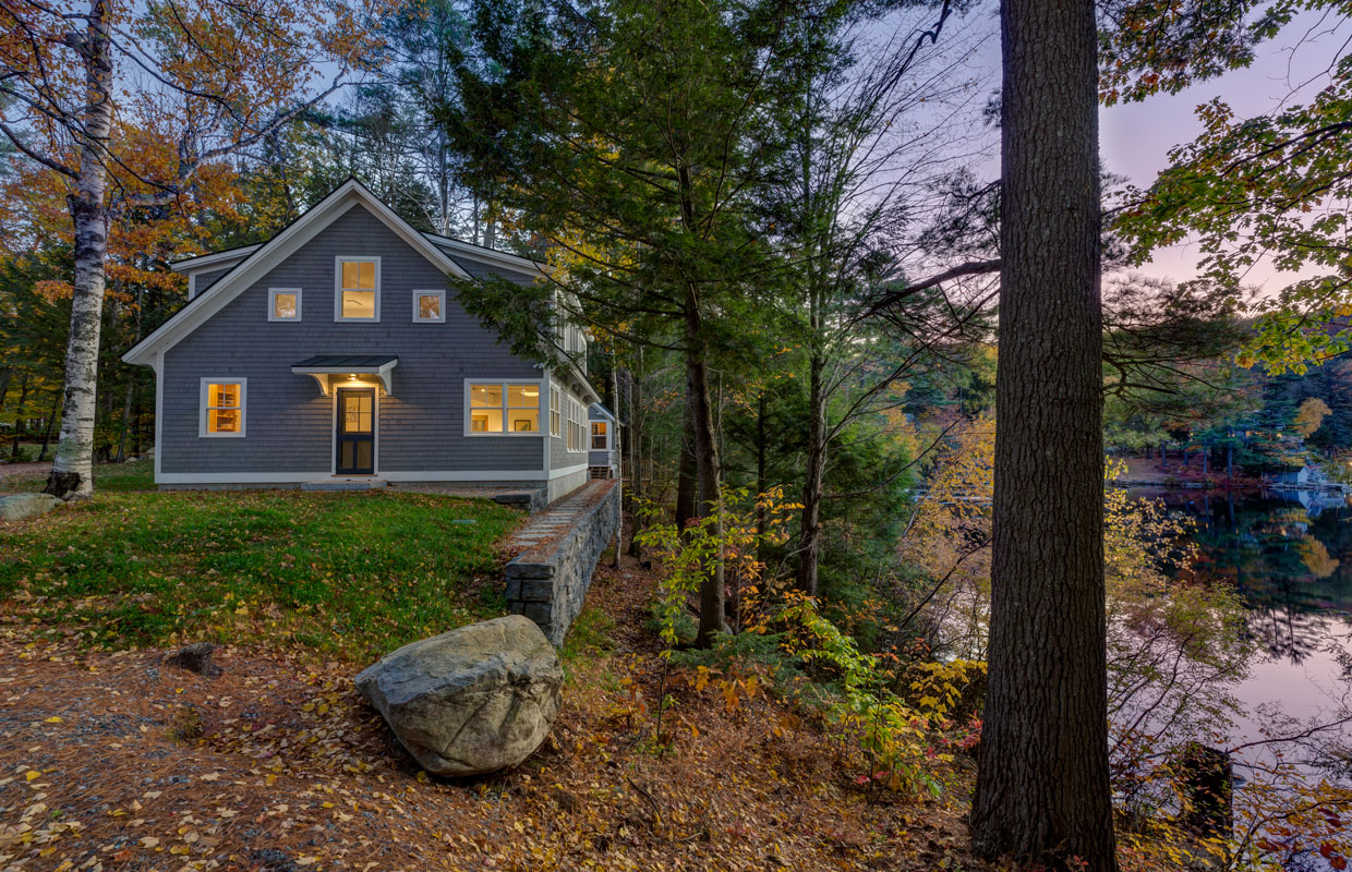 gray cottage by the water