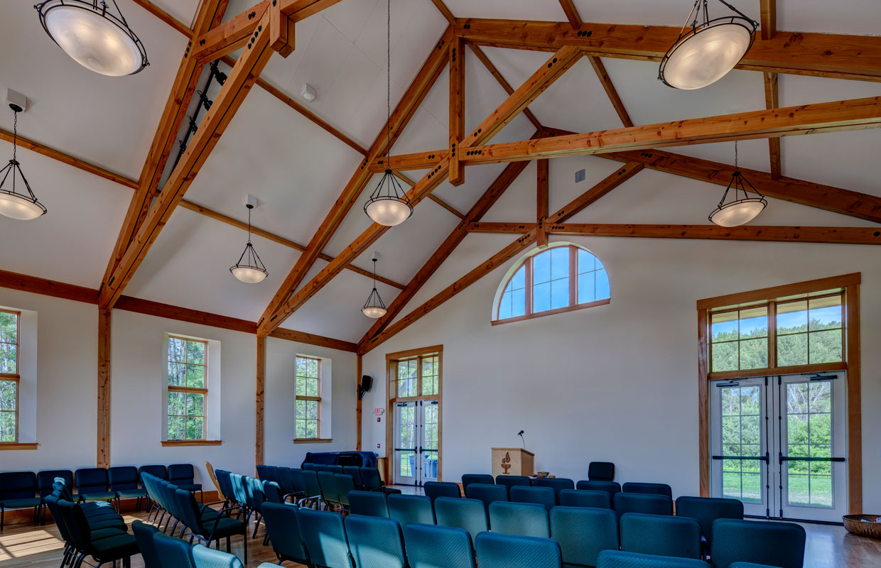timber-framed meeting house inside view