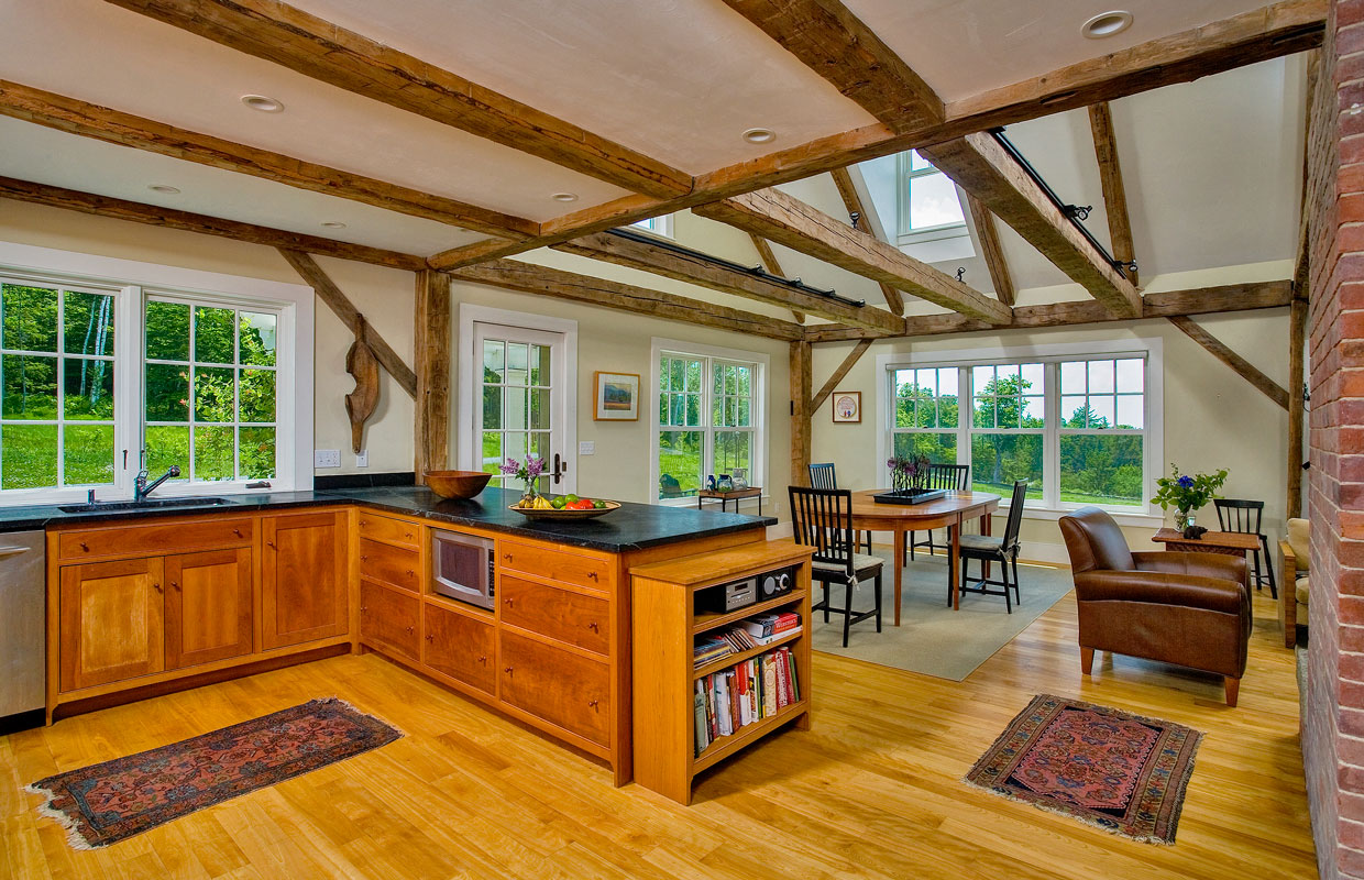 great room with wood floors and exposed beams