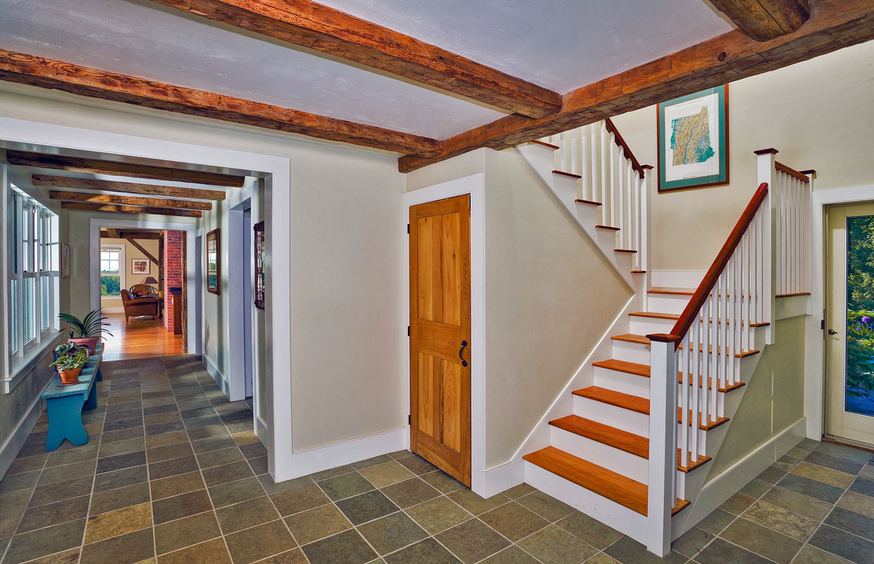 view of a staircase and tile floor