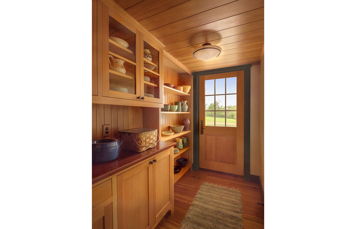 view of the front door from the inside of a farmhouse