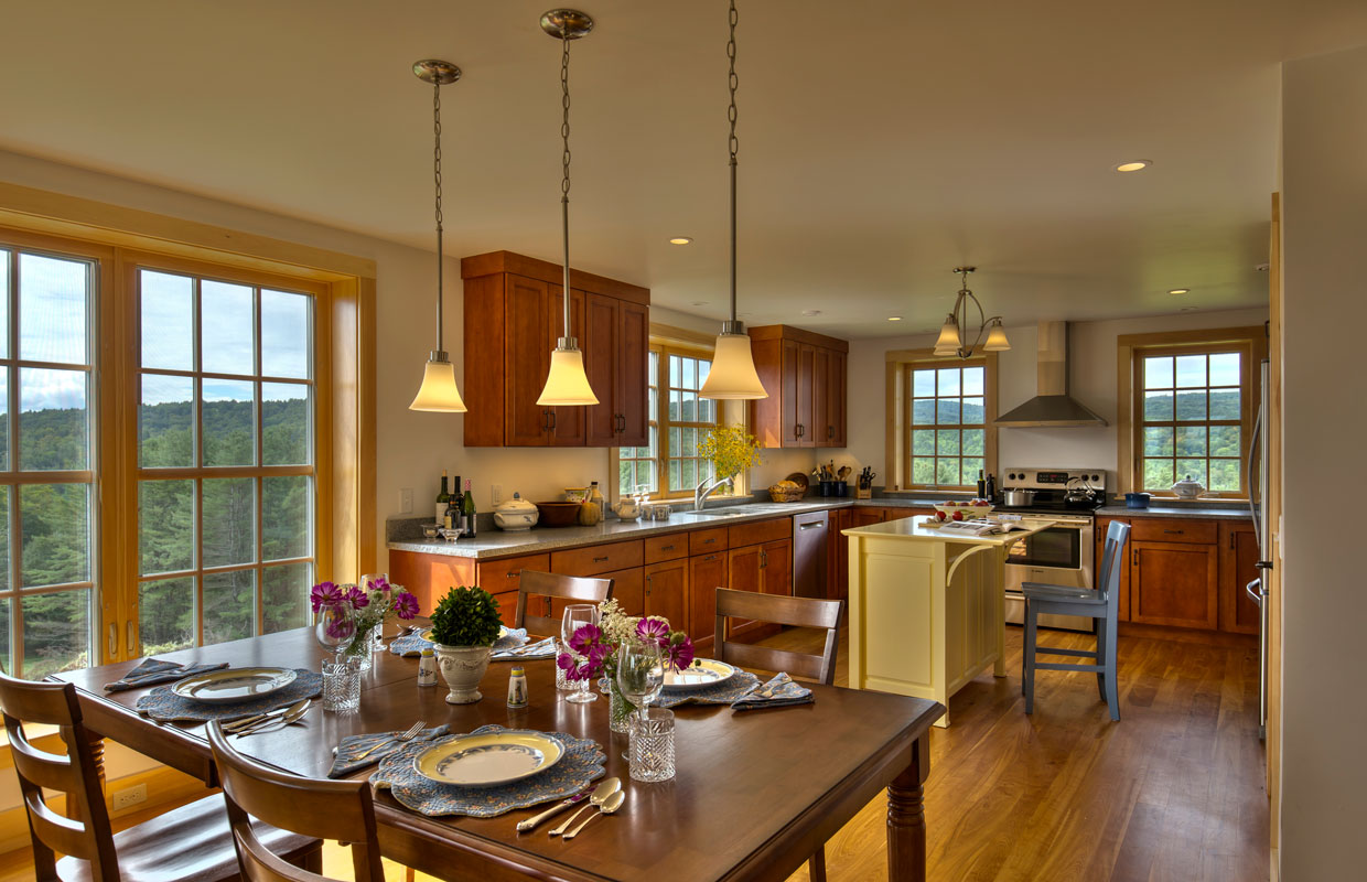 view from a large kitchen from the dining room table