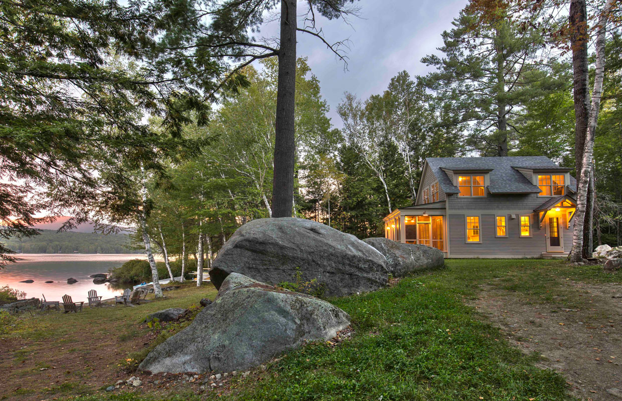 lakeside home at dusk