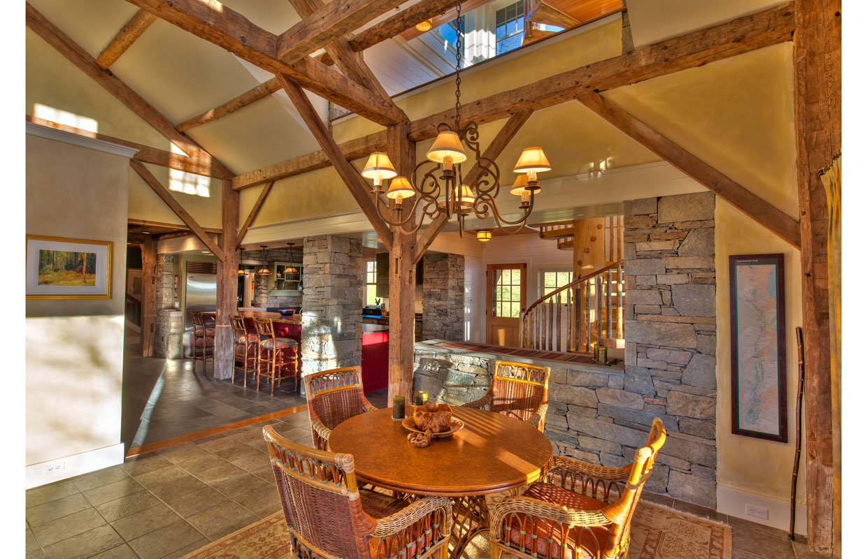 great room with lots of stone accents