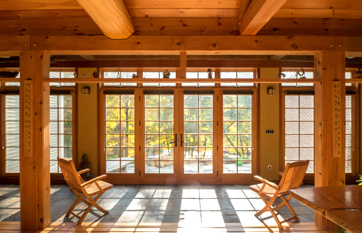 view from inside looking out a wall of windows